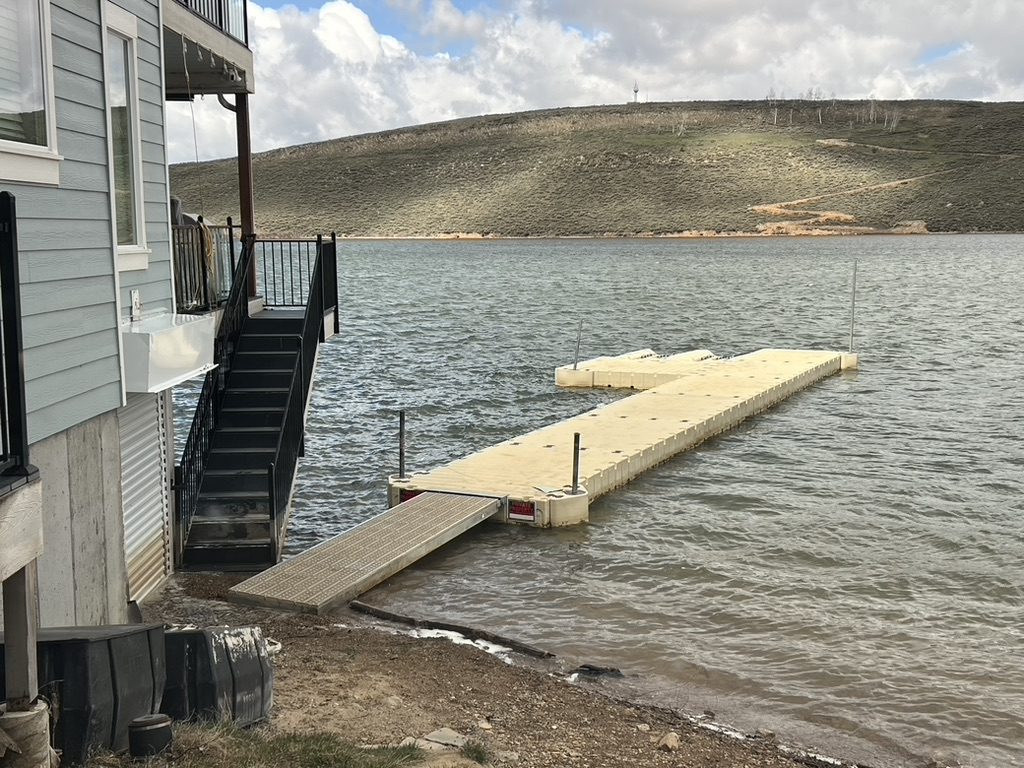 Stairs from the house leading straight down to the private floating dock on the reservoir