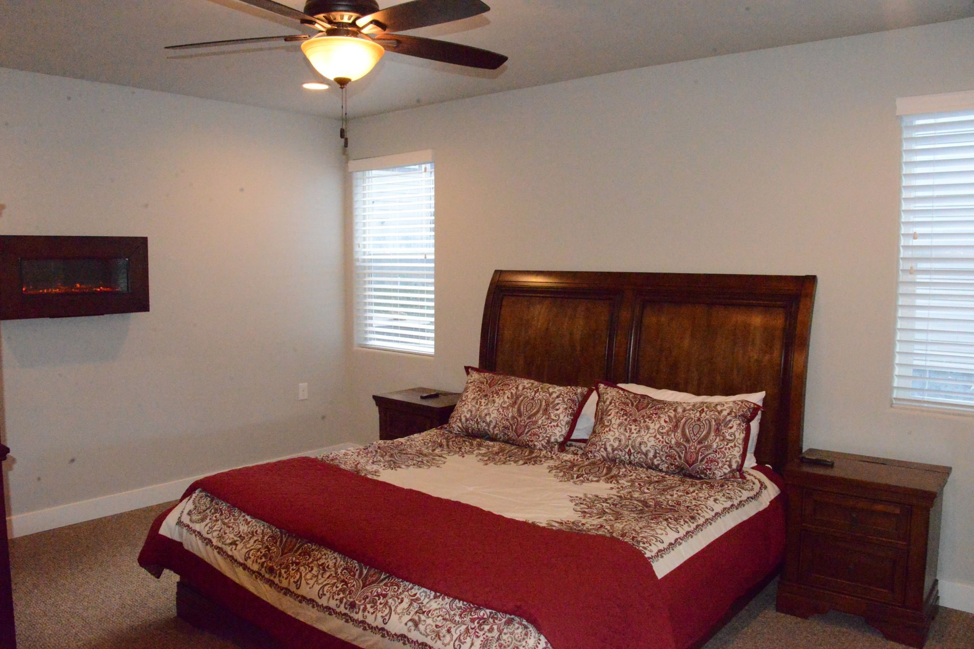 King suite with sleigh bed and wall fireplace